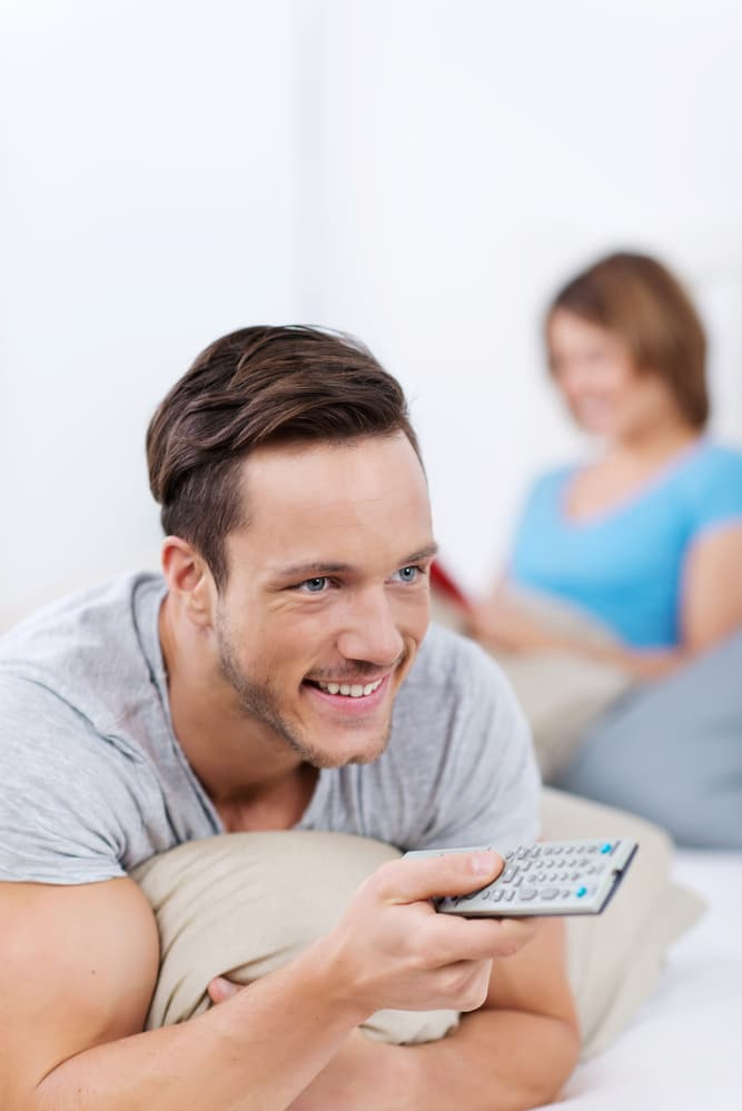 Man holding remote control
