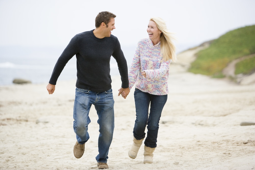 Couple walking in the beach