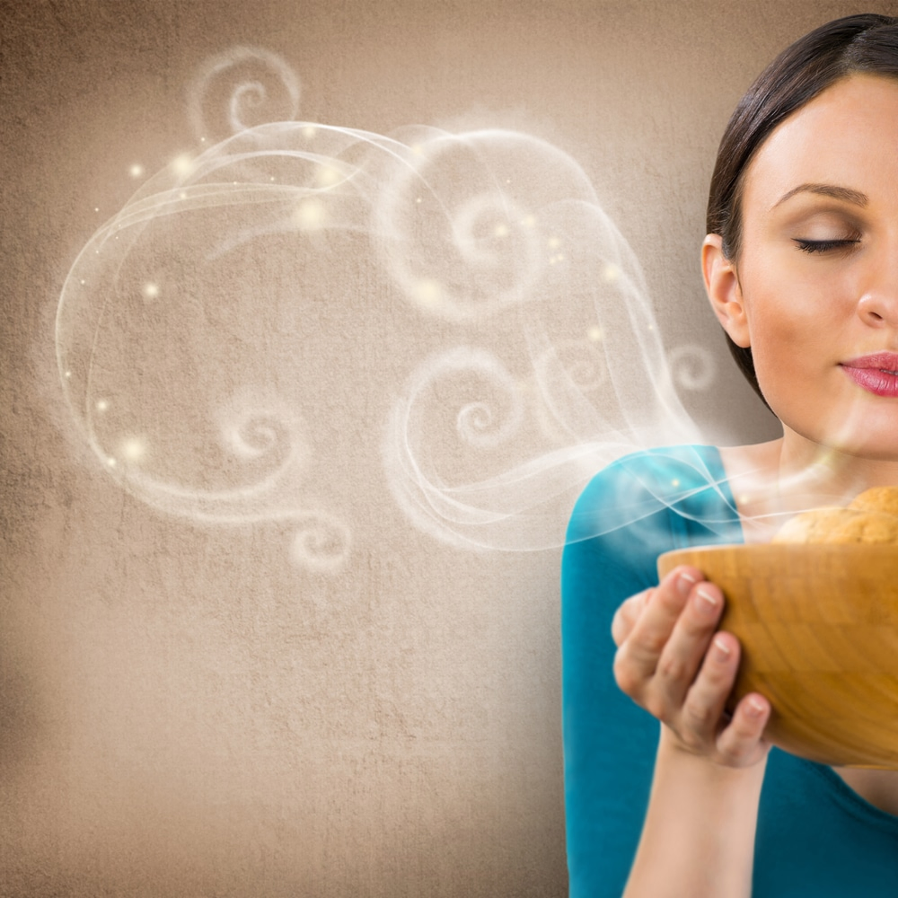 Woman smelling cookies