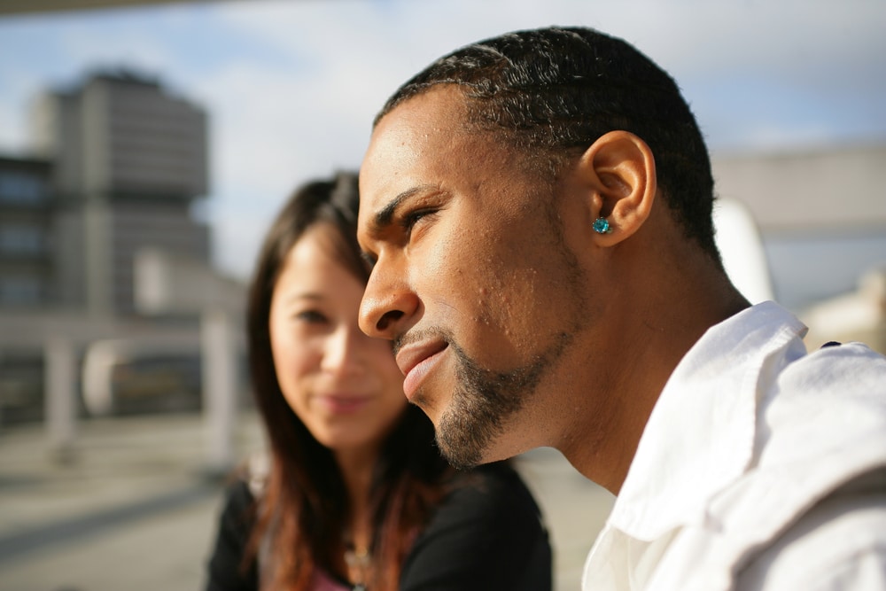 Woman sympathizing with boyfriend