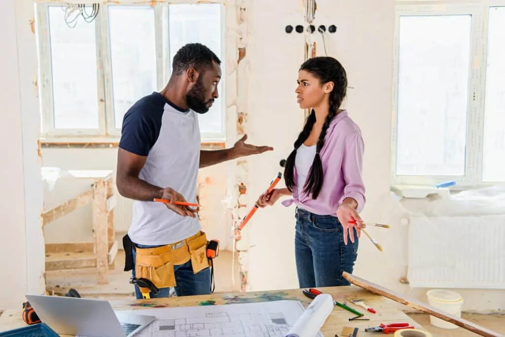 Couple Painting The House Arguing