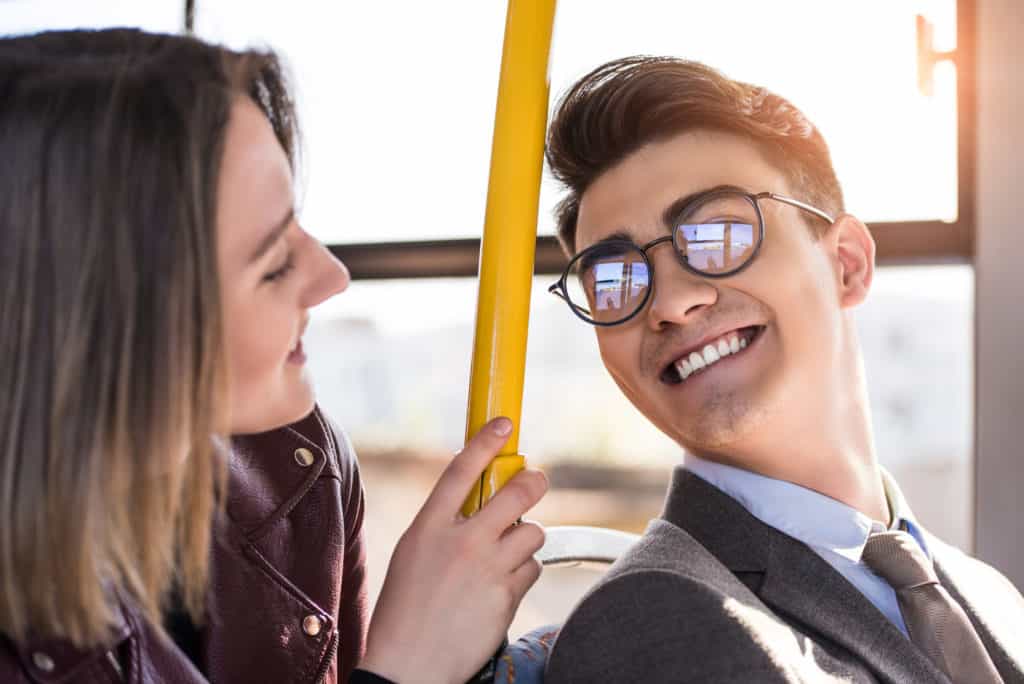 Couple In A Bus Smiling