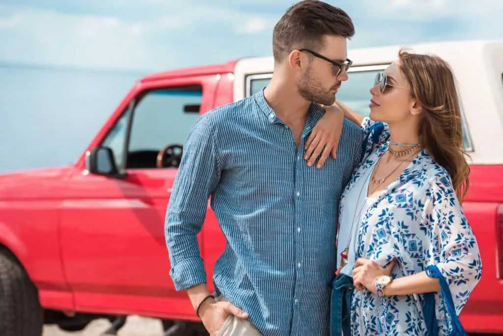 Couple With Truck In Background