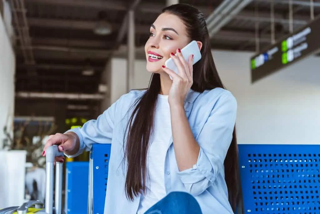 Happy Woman On The Phone