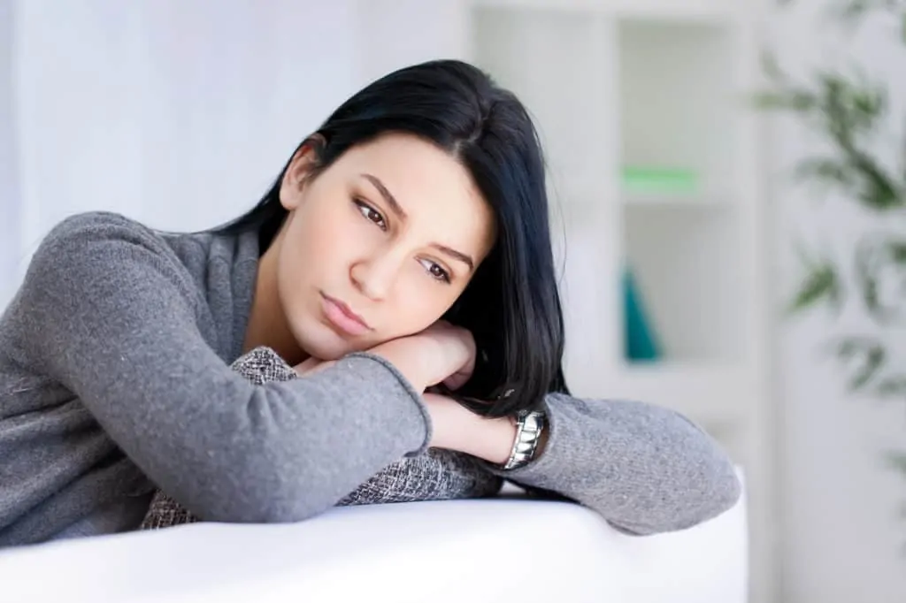 Lonely Woman On The Sofa