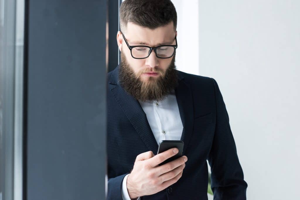 Man Using His Phone