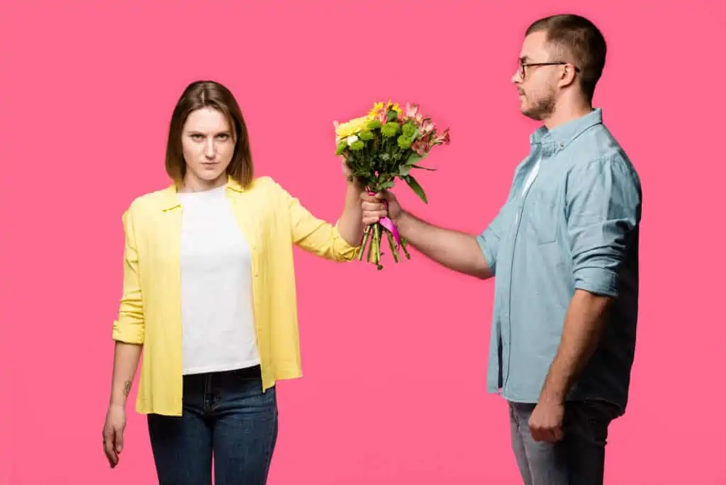 Husband Giving Flowers To Wife