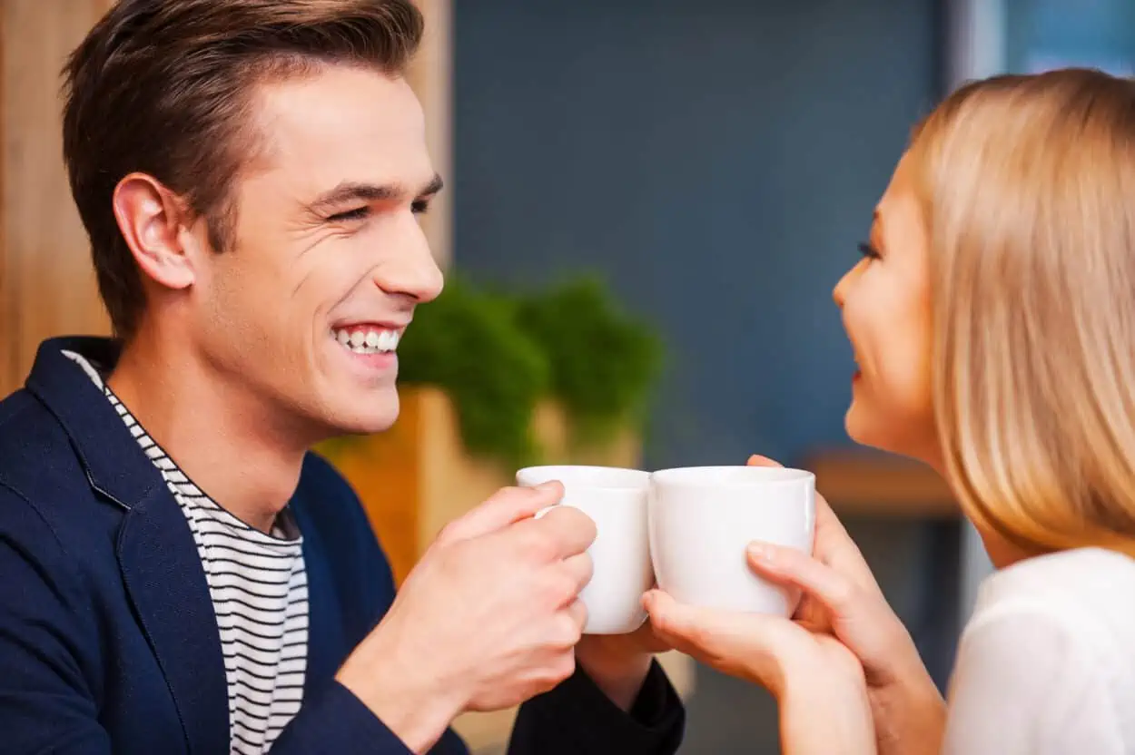 Couple talking over coffee