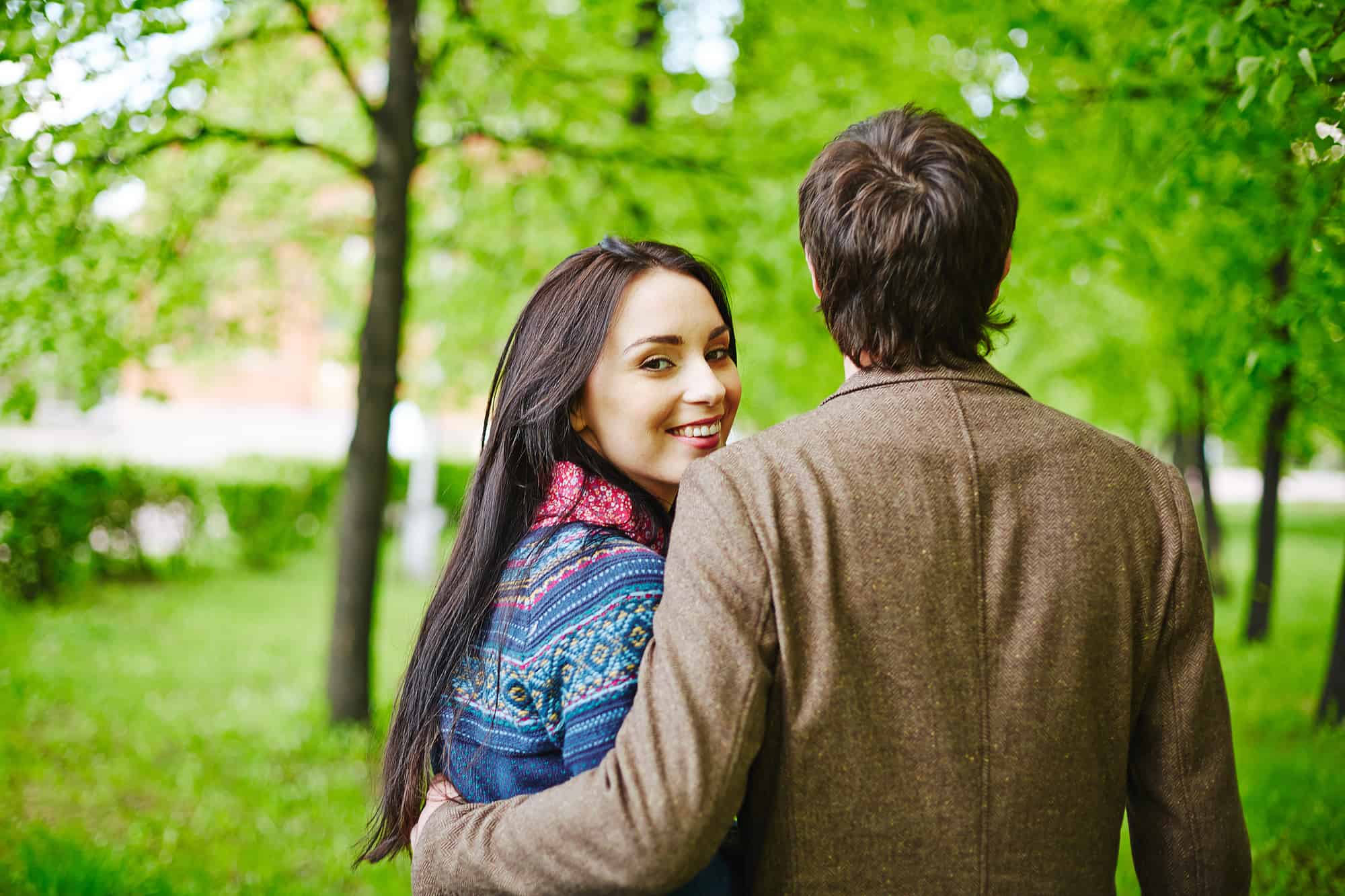 What does it mean when a guy hugs you and rubs your lower back?