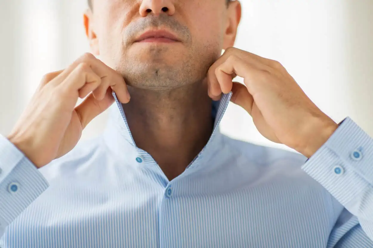 Man holding up his collar