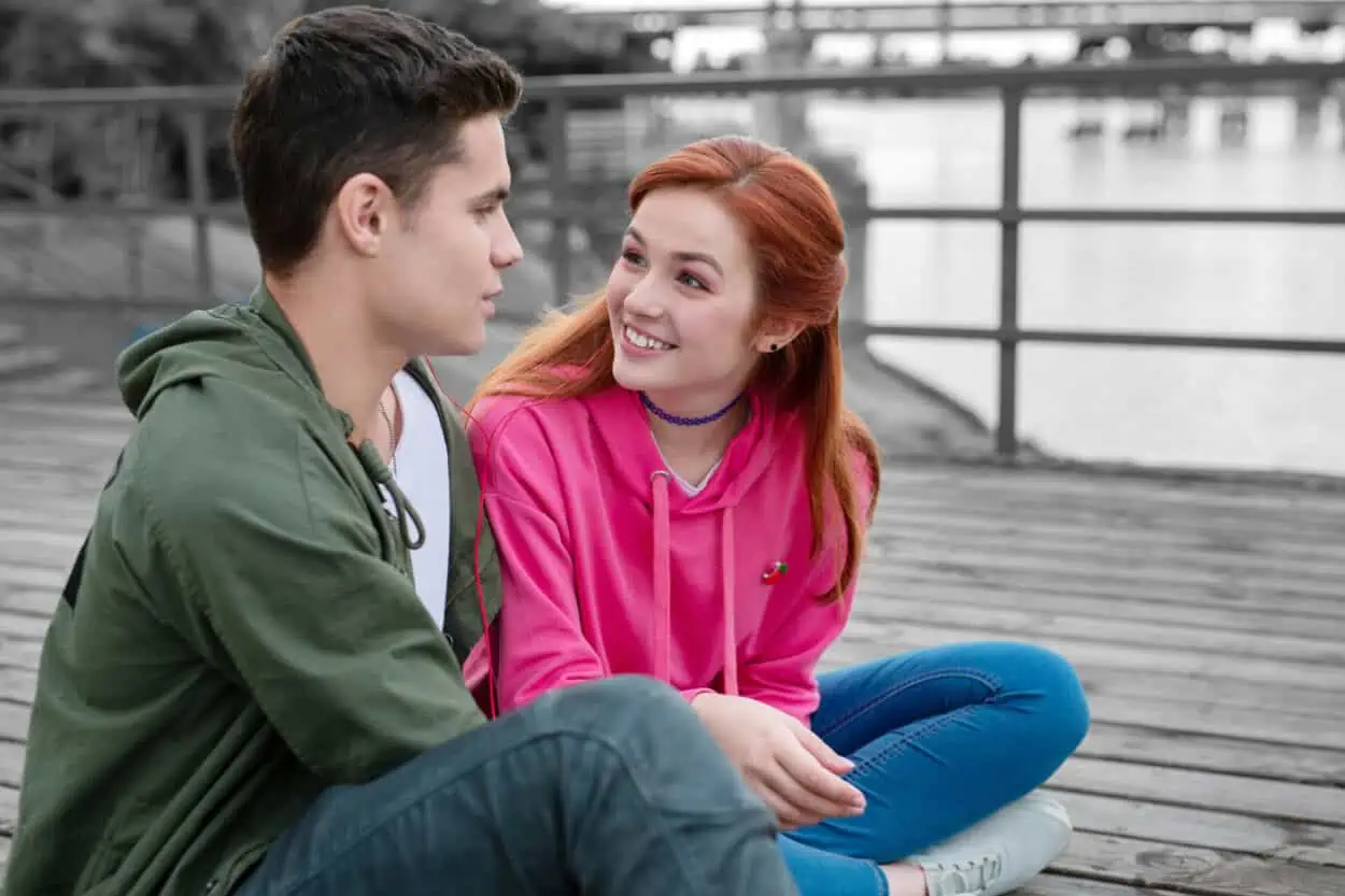 Couple talking on the dock